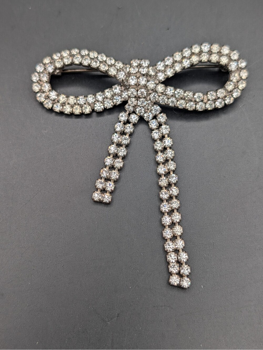 Vintage Rhinestone Ribbon Bow Brooch Pin Silver Tone Clear Paste Stones Unsigned